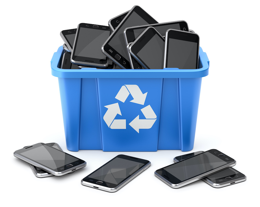 smart phones in a blue recycling bin