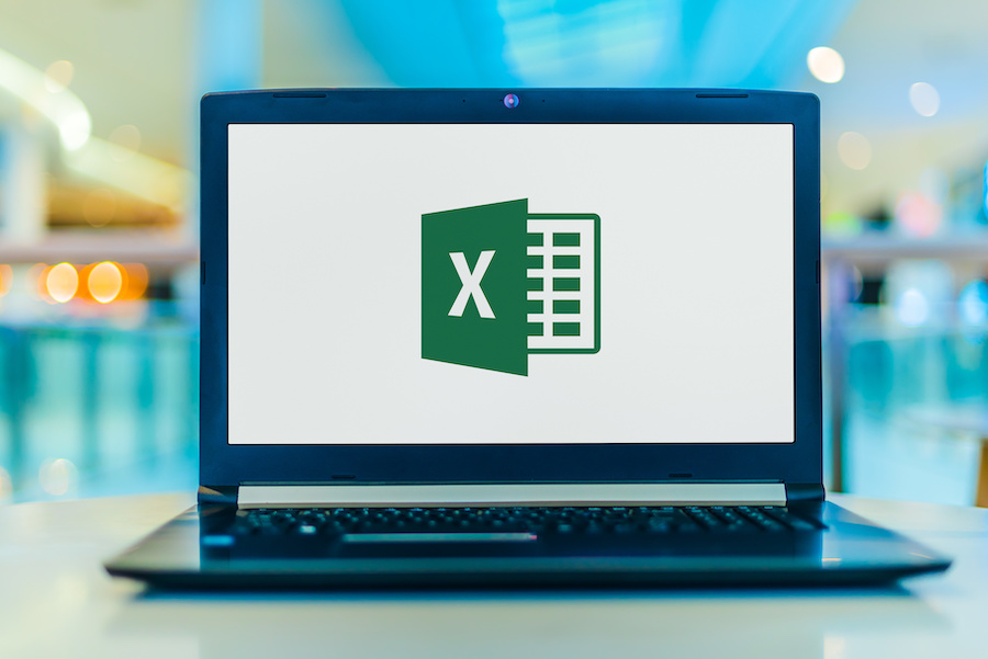 A laptop displaying the Microsoft Excel logo